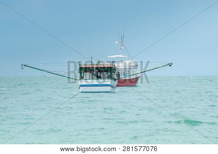 Bombinhas - Sc, Brazil - December 21, 2018: Fishing Boat Anchored On The Sea Of The Beach At Praia D