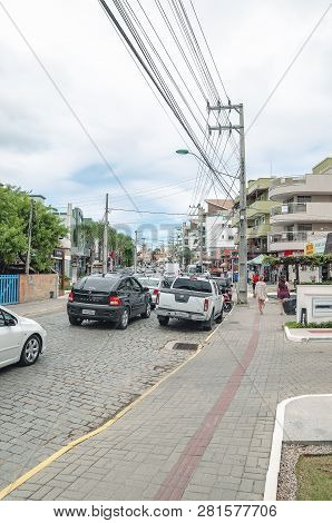 Bombinhas - Sc, Brazil - December 23, 2018: Street Of Bombinhas During Summer, Avenida Vereador Mano