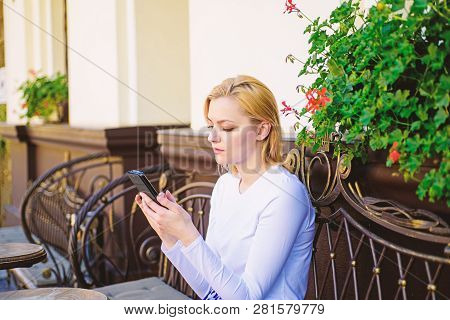 Keep In Touch. Woman Calm Face Texting Smartphone Cafe Terrace Urban Background. Lady Texting Messag