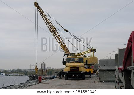 Repair Of The Bridge In The City, Construction Of The Bridge, Crane On The Bridge. Repair Of The New