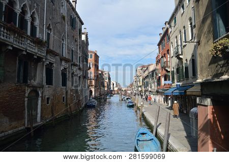 Fondamenta Dei Ormesini With Its Beautiful Buildings Boats Moored And Bridges In Venice. Travel, Hol