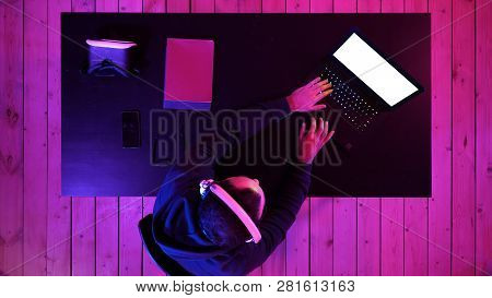 Professional Gamer Playing Video Games Streaming. White Display.