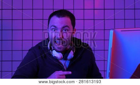 Gamer, Hacker, Programmer Talking About The Best Software, Game, Program On The Screen Of The Comput
