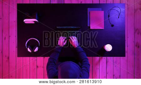 Gamer Playing A Game On A Laptop. Streaming And Watching Others Play.