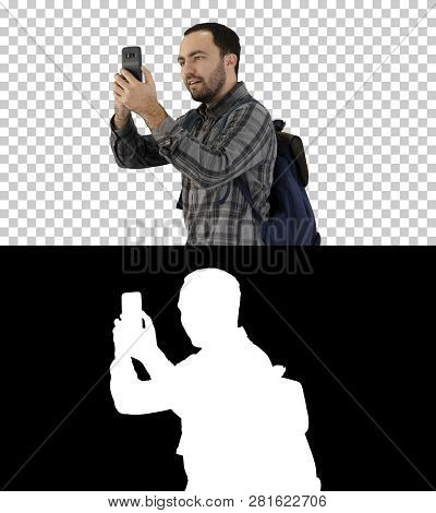 Attractive Young Tourist With Backpack Walking And Using Mobile Phone, Alpha Channel