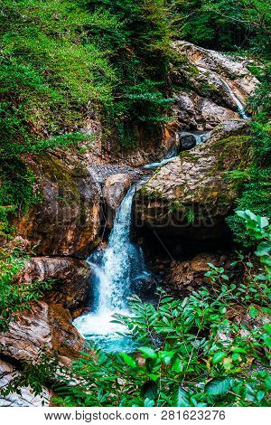 Mountain Cascade Waterfall. Eastern Abkhazia. Near The Town Of Tkvarcheli. Akarmara District.