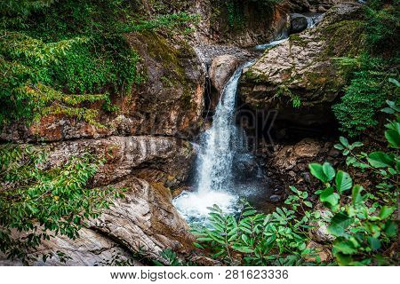 Mountain Cascade Waterfall. Eastern Abkhazia. Near The Town Of Tkvarcheli. Akarmara District.