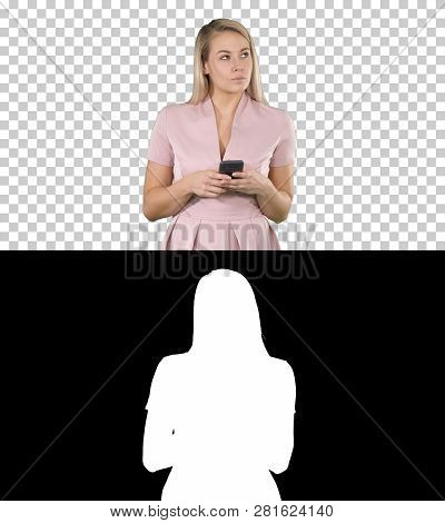 Portrait Of Smiling Young Lady Reading Text Message On Her Mobile Phone, Alpha Channel