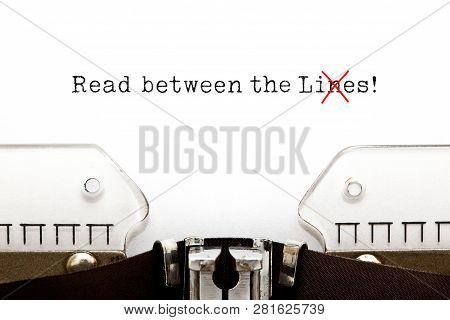 Text Read Between The Lies Typed On Vintage Typewriter. The Usually Used Word In The Original Idiom 