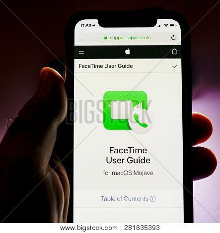 Paris, France - Jan 30, 2018: Man Holding Apple Iphone Xs With Facetime Icon And User Guide On The S
