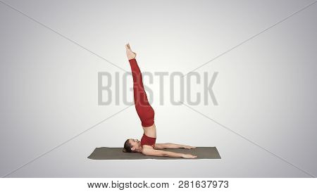 Beautiful Sporty Girl Doing Yoga Exercises For Abs Strength, Supported Shoulderstand Asana, Salamba 