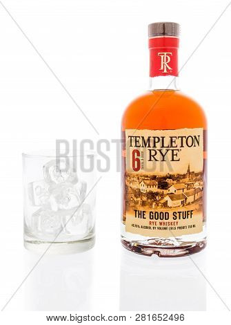 Winneconne, Wi - 29 January 2019: A Bottle Of Templeton Rye Whiskey With A Glass Of Ice On An Isolat