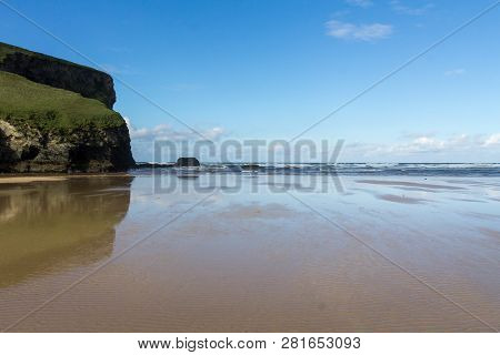 Sweeping Vista Of Mawgan Porth Beach, North Cornwall, England
