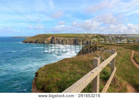 A Landscape View Of Mawgan Porth From The South West Coast Path, North Cornwall Along The Atlantic C