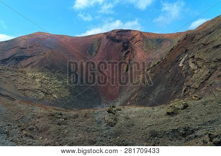 Crater Of A Volcano In Timanfaya National Park In Lanzarote,canary Islands,spain. The Spectacular Vo