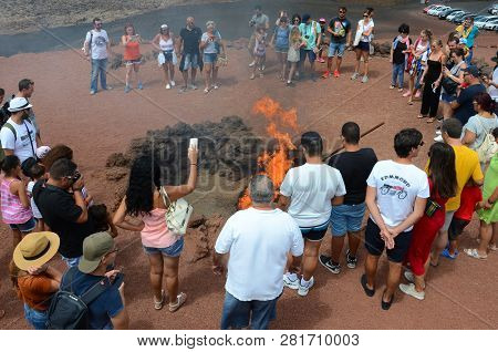 Lanzarote,canary Islands, Spain-september 1, 2018.tourists Making Photos Of Fire Demonstration In Th