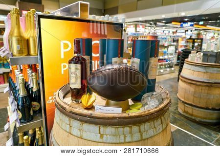 DUSSELDORF, GERMANY - CIRCA OCTOBER, 2018: Santa Teresa 1796 rum  and football on display at Dusseldorf airport.