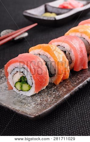 Salmon & Tuna Sushi Roll On A Plate