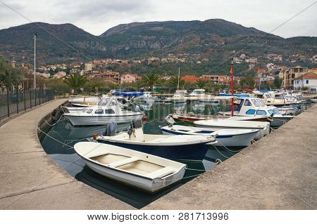 Cloudy Winter Day In Tivat City, Montenegro. View Of Marina Kalimanj