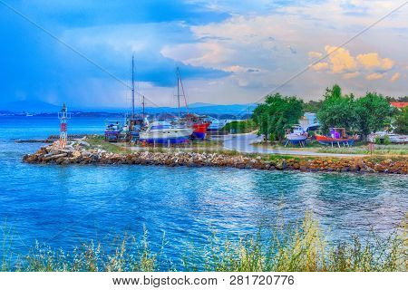 Sea Bay And Old Port With Boats In Nea Potidea Or Nea Poteidea In Peninsula Kassandra, Halkidiki, Gr