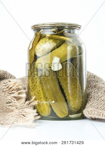 Pickled Cucumbers Isolated. Pickles In Glass Jar Isolated On White Background. Salted Cucumber In Ja