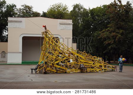 Woman Is Watching Art Installation In Park, Kropyvnytskyi, Ukraine, September 1, 2017
