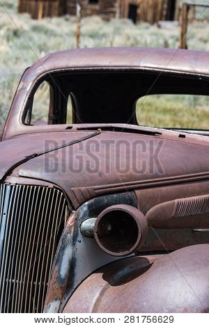 May 16, 2018 - Bodie, California: Rusty Old Jalopy Truck In Bodie Ghost Town Of California, An Old M