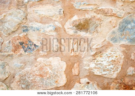 Texture of a stone wall. Old castle stone wall texture background. Briks stone and wall texture. Gre