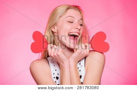 Celebrate Valentines Day. Girl Romantic Mood Dream About Date. Woman Hold Heart Valentines Decoratio