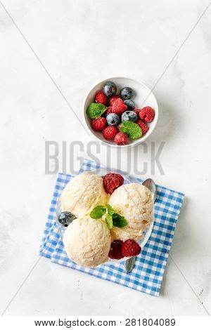 Topv View Of Vanilla Ice Cream With Berries