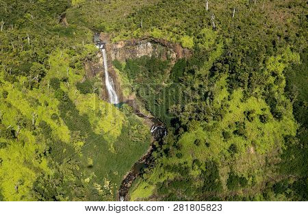 Aerial View Of Manawaiopuna Falls And Landscape Of Hawaiian Island Of Kauai From Helicopter Flight