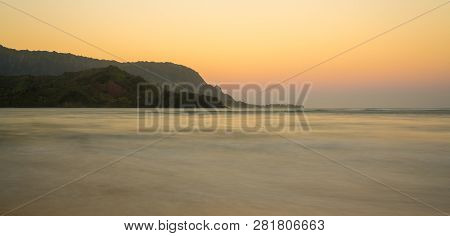 Sunrise Lights The Dawn Sky Above Hanalei Bay With The Na Pali Coast In The Background Near Hanalei,