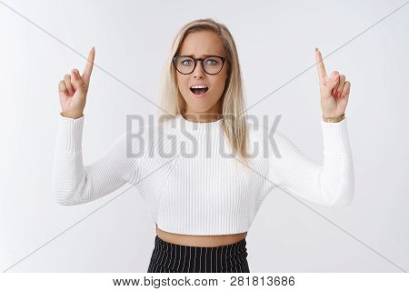 Girl Freaking Out Seing Gross Things Upwards. Portrait Of Stressed Panicking Glamour Woman With Blon