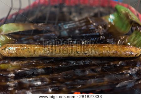 Roasted Or Grilled Notrhern Thai Spicy Sausage (sai Aua) For Sale At Thai Street Food Market Or Rest