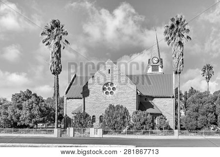 Loxton, South Africa, August 7, 2018: A Monochrome Street Scene, With The Dutch Reformed Church, In 