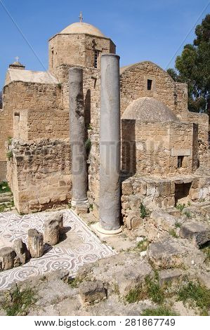 The Historic Church Of Yia Kyriaki Chrysopolitissa In Paphos Cyprus Showing The Building And The Sur