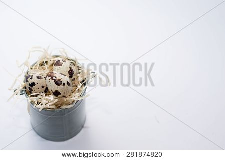 Quail Eggs Isolated On White . Easter Background. Food Postcard