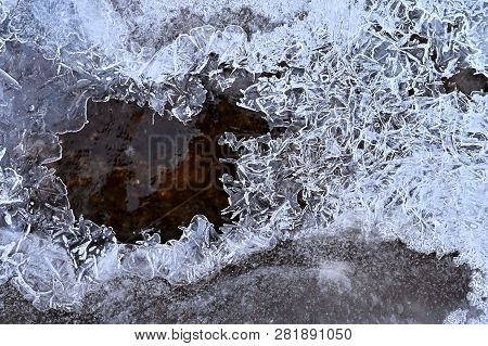 Frozen Stream. Beautiful Winter Nature Background. Frost, Ice And Snow In The Winter.
