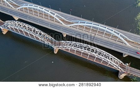 Aerial Top View Of Automobile And Railroad Darnitsky Bridge Across Dnieper River From Above, Kiev (k