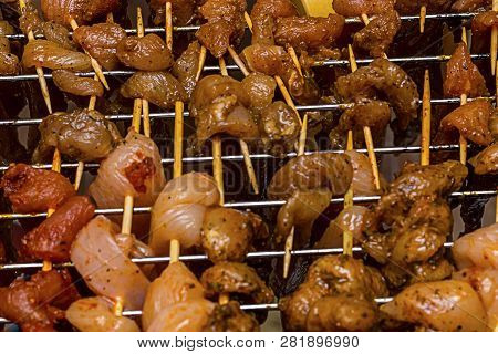 Delicious Appetizing Pieces Of Meat Pork Chicken Condiment Many Slides On Wooden Skewers On The Gril