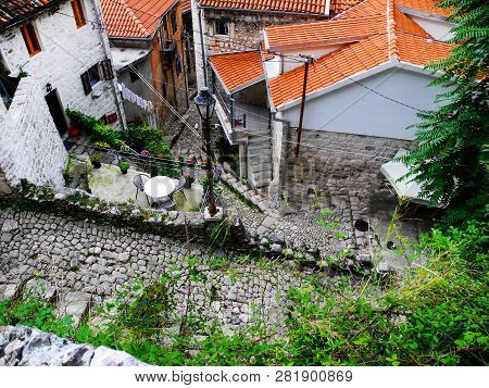 Old Building With Tiled Orange Roofs, Top View. Kotor Old Town, Montenegro. Crna Gora.