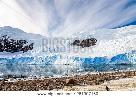 Huge Antarctic Glacier Reflected In The Antarctic Waters Of Neco Bay, Antarctica