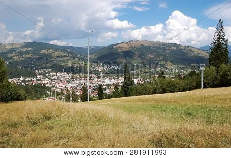 Panoramic View From Above Of The City Of Vatra Dornei And The Carpathian Mountains  A Summer Morning
