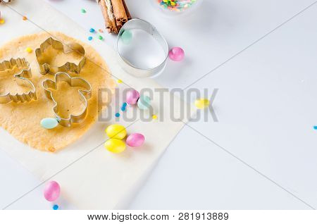 Easter Cooking Background, Dough And Indredients, Cuts For Cookies And Colored Sugar Décor For Bakin