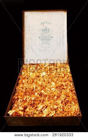 Lausanne / Switzerland - January 31, 2019: Pure 24 carat gold chips for safe investment.
