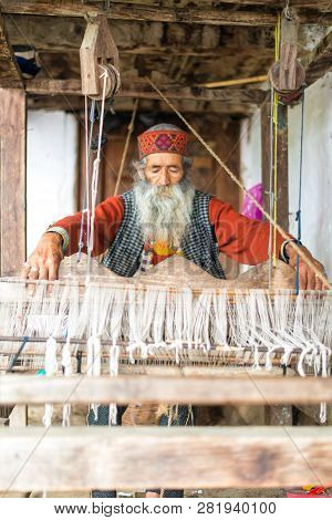 Kullu, Himachal Pradesh, India - August 09, 2018 : Himachali Pattu Saree Weaver On His Loom, Handloo