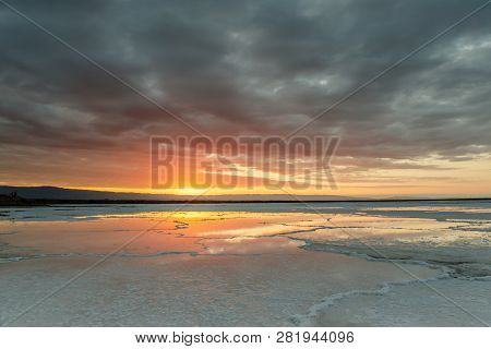 South Bay Salt Pond Stormy Skies.  Rare Photo Op Of A Dried Salt Pond During Maintenance Repair In A