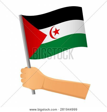 Sahrawi Arab Democratic Republic Flag In Hand. Patriotic Background. National Flag Of Sahrawi Arab D