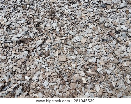 Brown Wood Chips Or Barkdust Or Mulch On The Ground