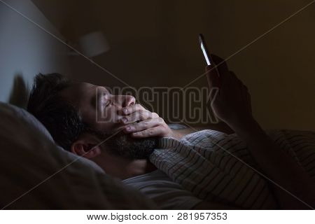 Adult Sleepy Yawning Male Awake Late At Night In Bed Surfing In Web, Can Not Fall Asleep/ Sleepy Tir